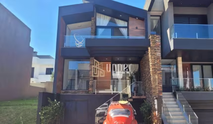 Casa com 3 dormitórios à venda, 170 m² por R$ 1.200.000 - Condomínio Primavera - Gravataí/RS