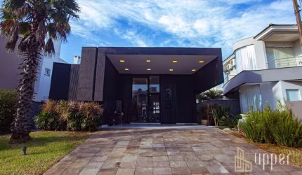 Casa com 3 dormitórios à venda, 200 m² por R$ 2.990.000,00 - Alphaville - Gravataí/RS