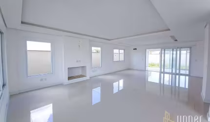 Casa com 3 dormitórios à venda, 310 m² por R$ 2.360.000,00 - Alphaville - Gravataí/RS