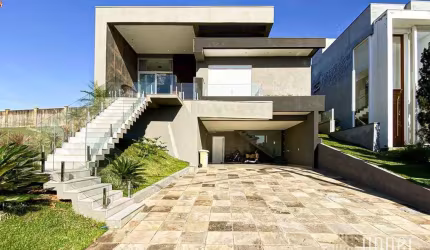 Casa com 4 dormitórios à venda, 252 m² por R$ 2.490.000,00 - Alphaville - Gravataí/RS