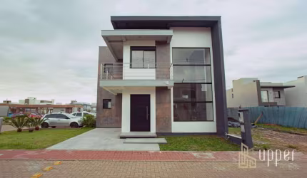 Casa com 3 dormitórios à venda, 140 m² por R$ 929.900,00 - Condomínio Vale das Cerejeiras - Gravataí/RS