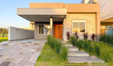 Casa com 3 dormitórios à venda, 142 m² por R$ 1.050.000,00 - Terras Alpha - Gravataí/RS