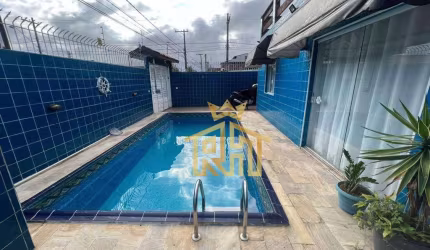 Casa semi isolada , 1 suíte  3 quartos no bairro de Maracanã em Praia Grande - SP