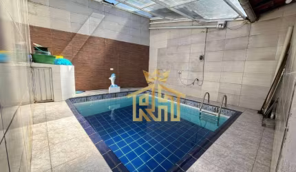 Casa com 2 dormitórios à venda, 82 m² por R$ 495.000,00 - Aviação - Praia Grande/SP