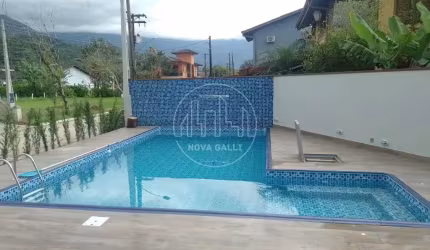 Casa em condomínio fechado com 3 quartos à venda em Horto Florestal, Ubatuba  por R$ 1.300.000