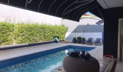 Casa com 3 dormitórios à venda, 302 m² por R$ 1.850.000,00 - Condomínio Residencial Terras do Caribe - Valinhos/SP