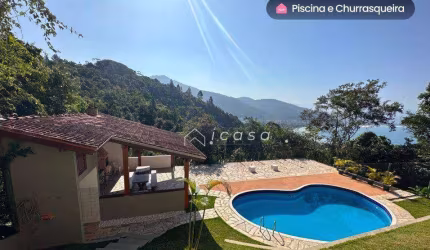 Sobrado com 4 dormitórios à venda, 850 m² por R$ 4.500.000,00 - Praia das Toninhas - Ubatuba/SP