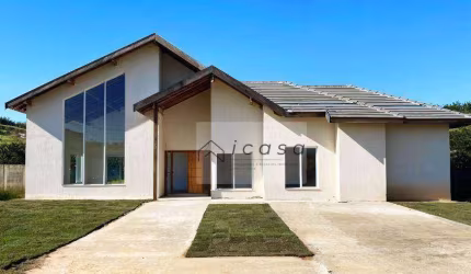 Casa com 3 dormitórios à venda, 200 m² por R$ 860.000,00 - Condomínio Village da Serra - Tremembé/SP