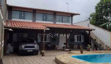 Casa com 4 dormitórios à venda, 247 m² por R$ 986.000,00 - Porto Novo - Caraguatatuba/SP
