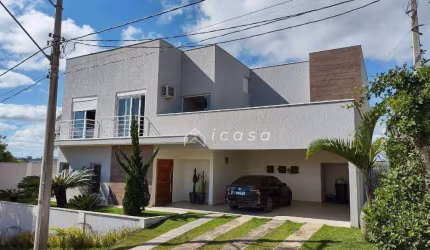 Sobrado com 3 dormitórios, 365 m² - venda por R$ 1.800.000,00 ou aluguel por R$ 13.862,00/mês - Condomínio Lago Dourado - Jacareí/SP