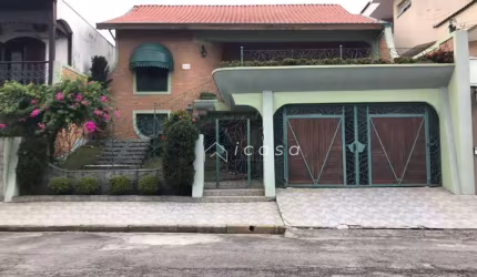 Casa com 4 dormitórios à venda, 229 m² por R$ 1.100.000,00 - Vila São João - Caçapava/SP