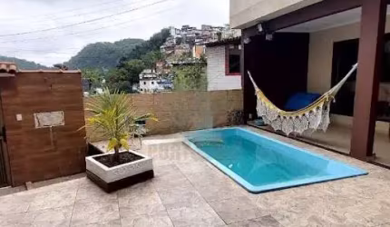 Casa com 3 dormitórios à venda, 100 m² por R$ 510.000,00 - Morro de São Bento - Santos/SP