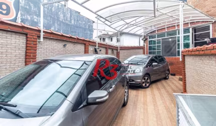 Sobrado com 3 dormitórios à venda, 139 m² por R$ 765.000,00 - Marapé - Santos/SP