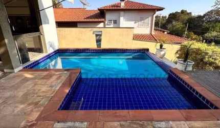Casa com 3 dormitórios à venda, 320 m² por R$ 1.590.000,00 - Condomínio Haras São Luiz - Salto/SP