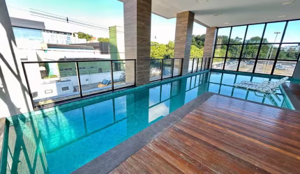 Apartamento à venda no bairro Anita Garibaldi, Joinville/SC.  Sala de estar, jantar, cozinha e sacada com churrasqueira integradas,