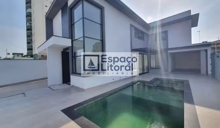 Sobrado com 4 dormitórios à venda, 245 m² por R$ 1.950.000,00 - Indaiá - Caraguatatuba/SP