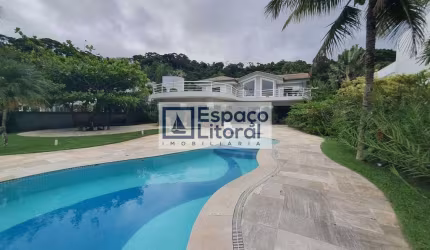 Casa à venda, 573 m² por R$ 9.500.000,00 - Praia Cocanha - Caraguatatuba/SP