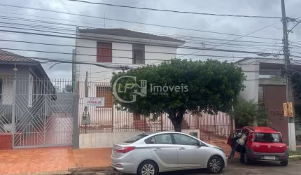 Casa espaçosa e luxuosa no Centro de Campo Grande-MS: 6 quartos, 4 salas, 2 banheiros, 12 vagas de garagem!