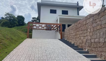 Casa com 3 dormitórios à venda, 209 m² por R$ 1.399.100,00 - Condomínio Picollo Villaggio - Louveira/SP