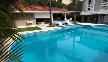 Alphaville 10 - Casa com 694m², 4 Suítes, 4 Vagas, Sauna e Churrasqueira em Sant