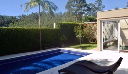 Casa com 4 dormitórios à venda, 450 m² por R$ 6.890.000 - Tamboré - Santana de P