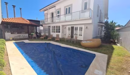 Casa com 4 dormitórios à venda, 598 m² por R$ 4.500.000 - Alphaville Residencial