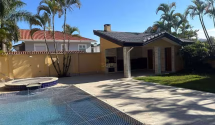 Casa com 4 dormitórios à venda, 460 m² por R$ 4.500.000 - Tamboré - Santana de P