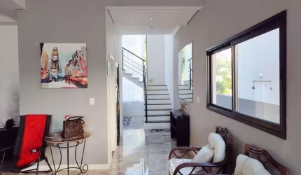 Casa com 3 dormitórios à venda, 290 m² por R$ 1.850.000 - Suru - Santana de Parn