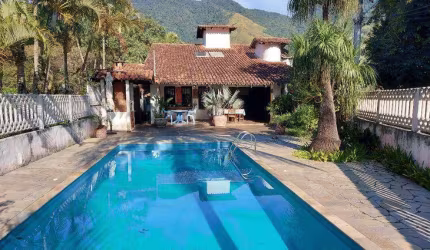 Casa com 3 dormitórios à venda, 238 m² por R$ 980.000,00 - São Francisco - São Sebastião/SP