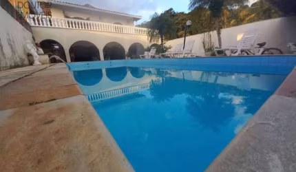 Casa com 5 dormitórios à venda, 350 m² por R$ 1.200.000,00 - Balneário Praia do Pernambuco - Guarujá/SP