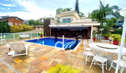 Casa com 3 dormitórios à venda, 447 m² por R$ 3.980.000,00 - Condomínio Marambaia - Vinhedo/SP