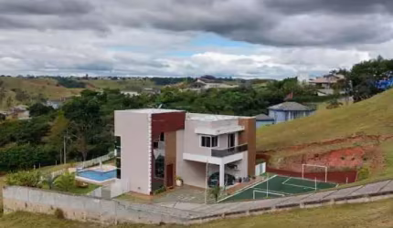 CASA EM CONDOMINIO 04 DOMITÓRIOS SENDO 02 SUITE - RIO COMPRIDO - JACAREÍ SP