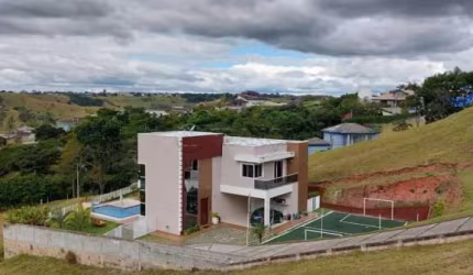 CASA EM CONDOMINIO 04 DOMITÓRIOS SENDO 02 SUITE - RIO COMPRIDO - JACAREÍ SP