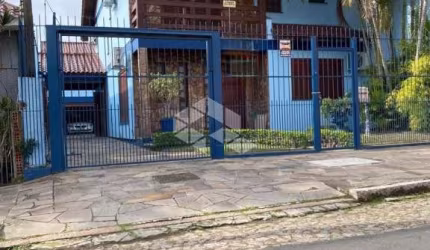 Casa com 4 quartos à venda na Rua Ararás, 344, Sarandi, Porto Alegre, 292 m2 por R$ 1.200.000