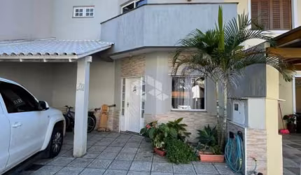 Casa em condomínio fechado com 3 quartos à venda na Rua Deputado Hugo Mardini, 1780, Passo das Pedras, Porto Alegre, 140 m2 por R$ 680.000
