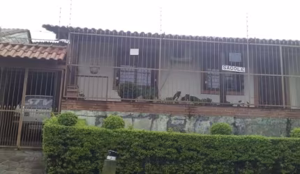 Casa com 3 quartos à venda na Rua Abram Goldsztein, 59, Jardim Carvalho, Porto Alegre, 104 m2 por R$ 389.999