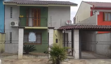 Casa em condomínio fechado com 3 quartos à venda na Rua Martinho Lutero, 508, Harmonia, Canoas, 150 m2 por R$ 445.000