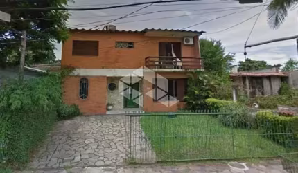 Casa com 3 quartos à venda na Rua Jacundá, 670, Guarujá, Porto Alegre, 245 m2 por R$ 530.000