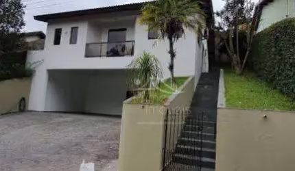 Casa com 3 dormitórios, 200 m² - venda por R$ 1.800.000,00 ou aluguel por R$ 8.000,00/mês - Condomínio Arujá Country Club - Arujá/SP