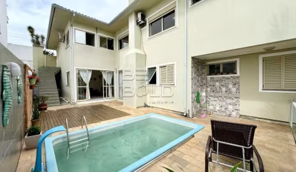 Casa em condomínio fechado com 5 quartos à venda na Travessa América, 68, Coqueiros, Florianópolis por R$ 2.500.000