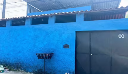 Casa com garagem financiada pelo banco em Maria Helena.