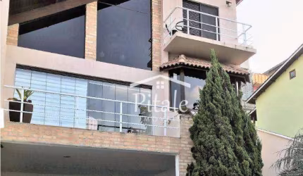 Casa com 3 dormitórios à venda, 215 m² por R$ 1.100.000,00 - Parque Nova Jandira - Jandira/SP