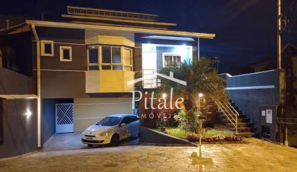 Casa com 3 dormitórios à venda, 369 m² por R$ 1.300.000 - Parque Nova Jandira - Jandira/SP