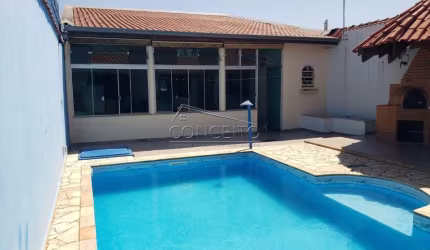 Casa térrea no bairro Monte Líbano com 142,08 m² | 2 dormitórios, ampla área gourmet e 3 vagas de garagem.