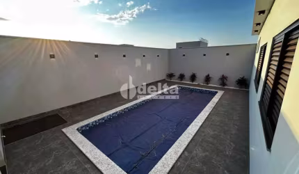 Casa residencial disponível para venda no bairro Quinta Alto Umuarama em Uberlândia - MG.