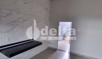 Casa residencial disponível para venda no bairro Jardim Brasília em Uberlândia-MG