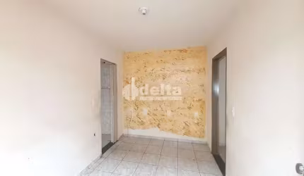 Casa residencial disponível para venda no bairro Brasil em Uberlândia-MG
