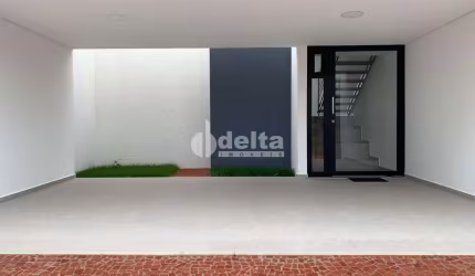 Casa residencial disponível para venda no bairro Jardim Karaíba em Uberlândia-MG