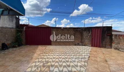 Casa residencial disponível para venda no bairro Custódio Pereira em Uberlândia-MG