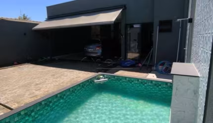 Casa residencial disponível para venda no bairro Jardim das Palmeiras em Uberlândia-MG